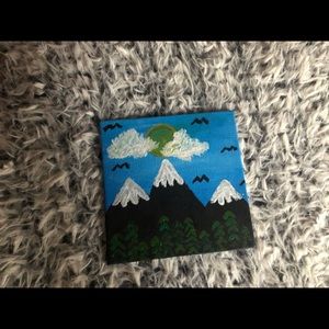 Mountains, birds, sun and clouds